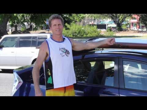 How to strap a SUP or surfboard to a car without roof racks