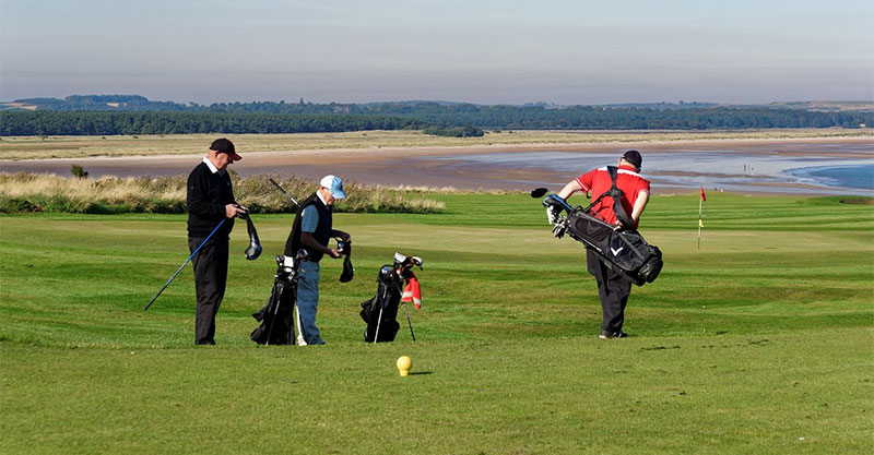 golfers with bags