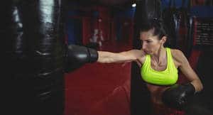 woman at punching bag