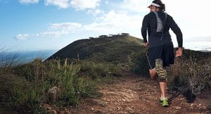 trail runner on mountain trail