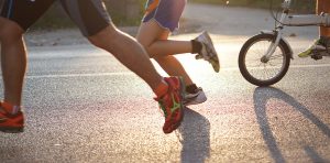 people running and biking