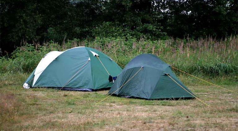 two tents in a field