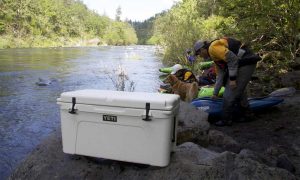 yeti cooler on river bank