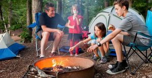 family camping making smores