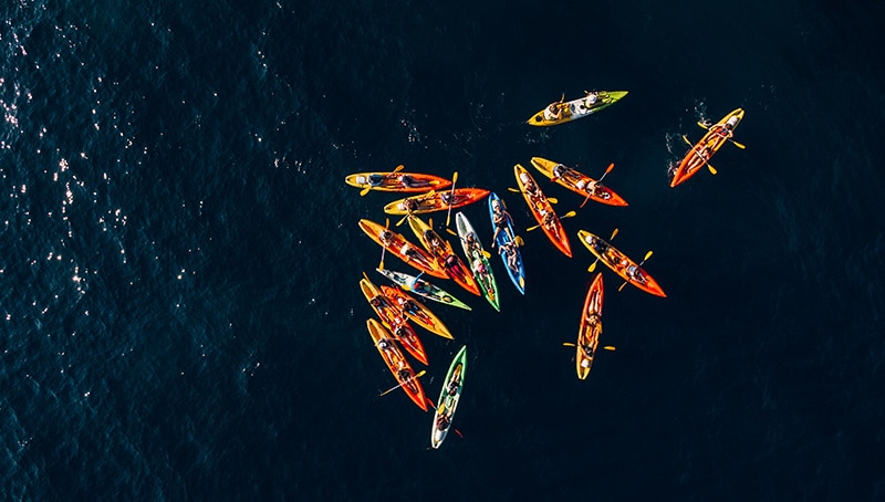 group of kayakers in sea