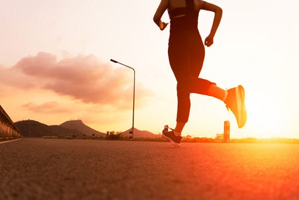 How Running Changes Your Body 1 woman running outside