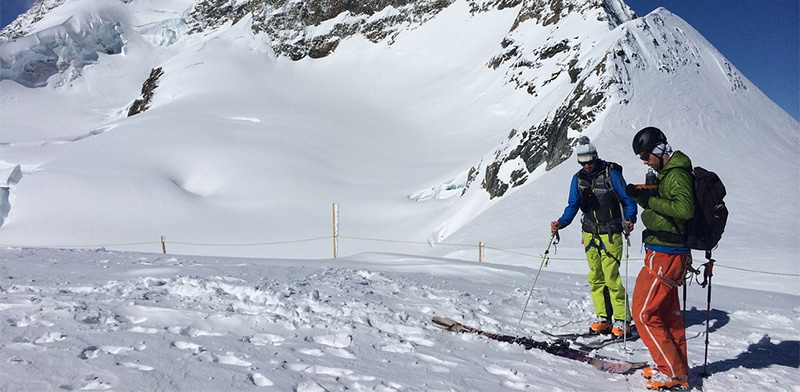 Essential Skiing Tips for Beginners 1 two skiers