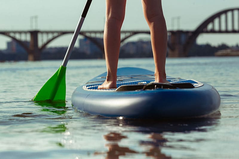 How Long Do Inflatable Paddle Boards Last? 1 closeup sup and sup paddle