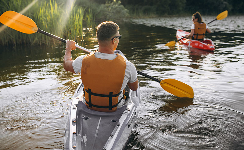 Do You Have To Register A Kayak Or Inflatable Kayak? 1 couple kayaking in lake