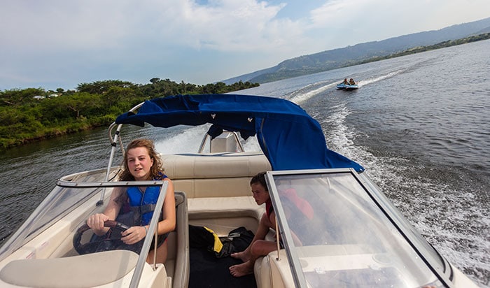 Do You Need A License To Drive A Boat? (Laws For All 50 States) 10 girl driving boat