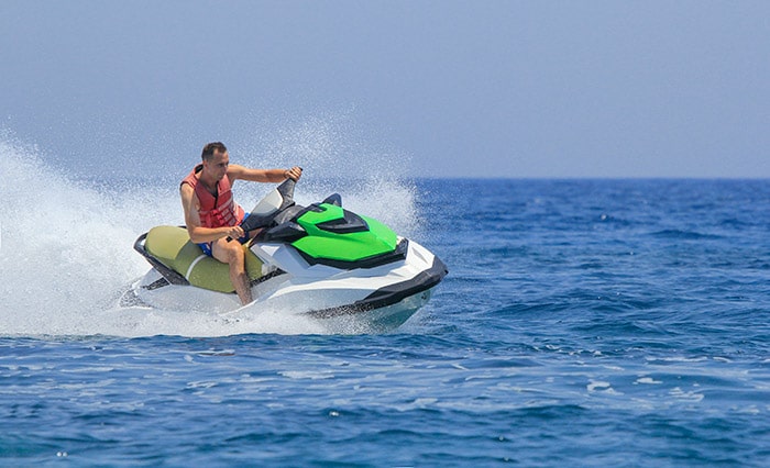 Do You Need A License To Drive A Boat? (Laws For All 50 States) 4 guy on jetski