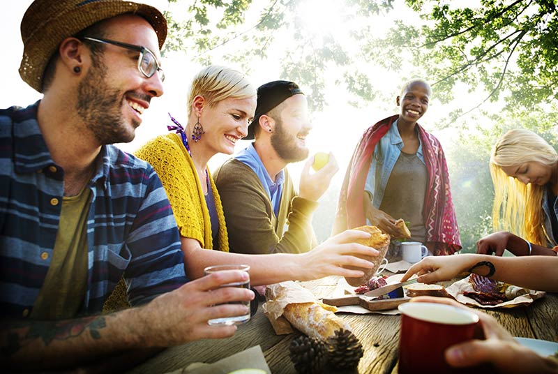 friends eating campsite