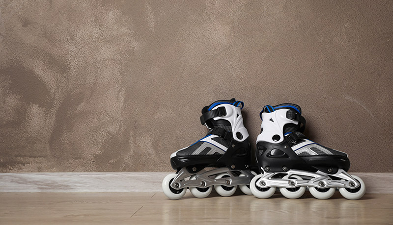 Can You Rollerblade or Roller Skate On A Treadmill? 1 inline skates by wall