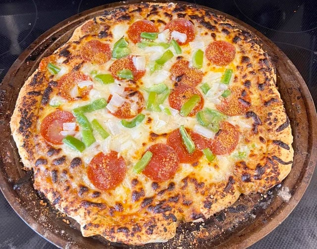 Can You Cut Pizza On A Pizza Stone? 1 pizza on stone