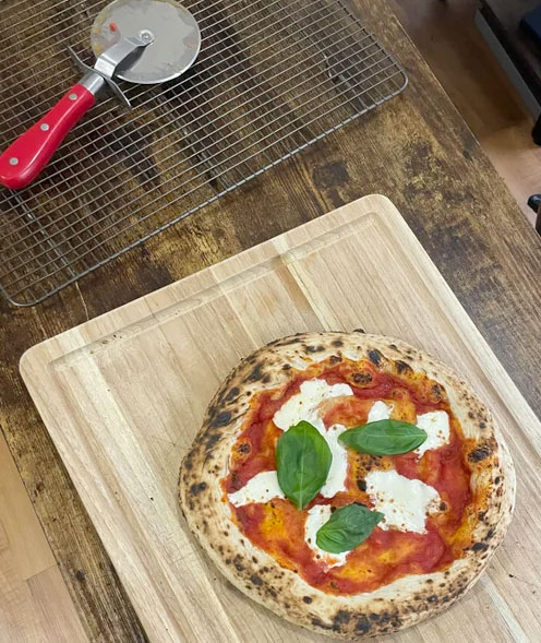Can You Cut Pizza On A Pizza Stone? 3 pizza with pizza wheel