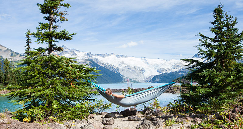 What Are The Best Camping Hammocks On The Market? (2024) 9 woman in camping hammock in Garibaldi Lakes, BC