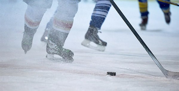 How To Measure A Hockey Stick & Get The Right Size 1 hockey game close up