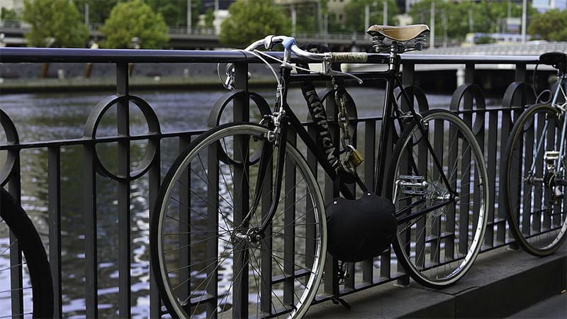 How To Lock Your Bike Without A Bike Rack 1 bike locked to bridge