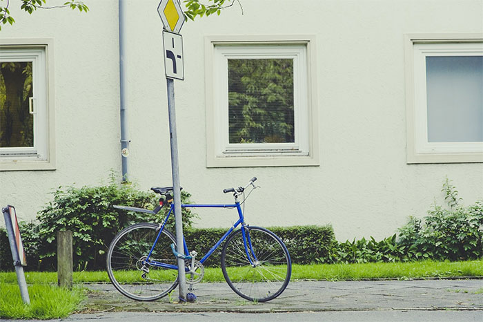 How To Lock Your Bike Without A Bike Rack 4 bike locked to sign