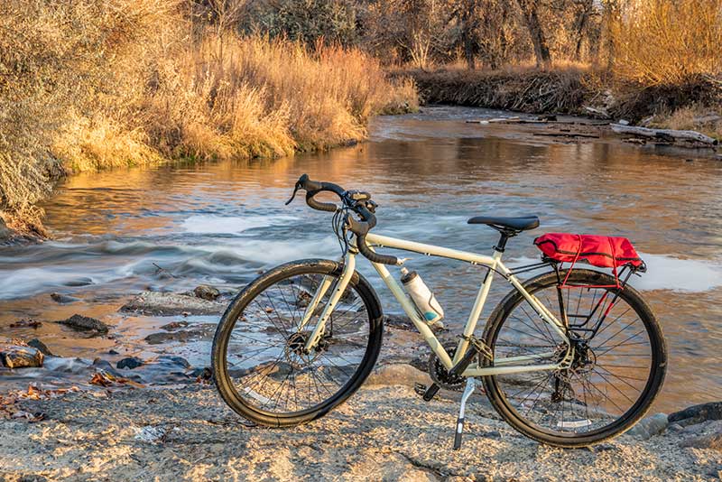 Why Don’t Road Bikes Have Kickstands? 1 bike with kickstand by stream