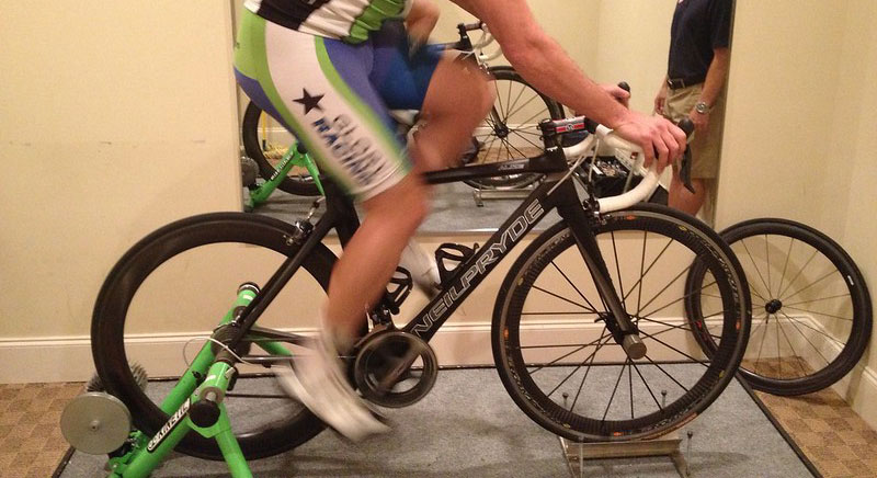 Do Bike Trainers Wear Out Tires? 1 guy using a bike trainer