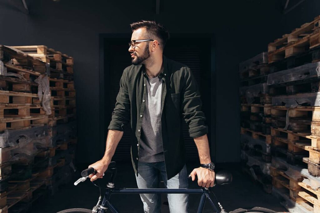 Make Travel With Your Bike Easy With A Good Bike Bag Or Case (2022) 1 man-with-bike